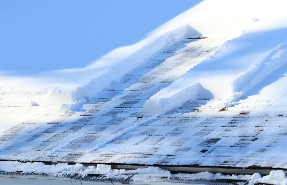 shingle roof covered in snow in St Paul, Minnesota
